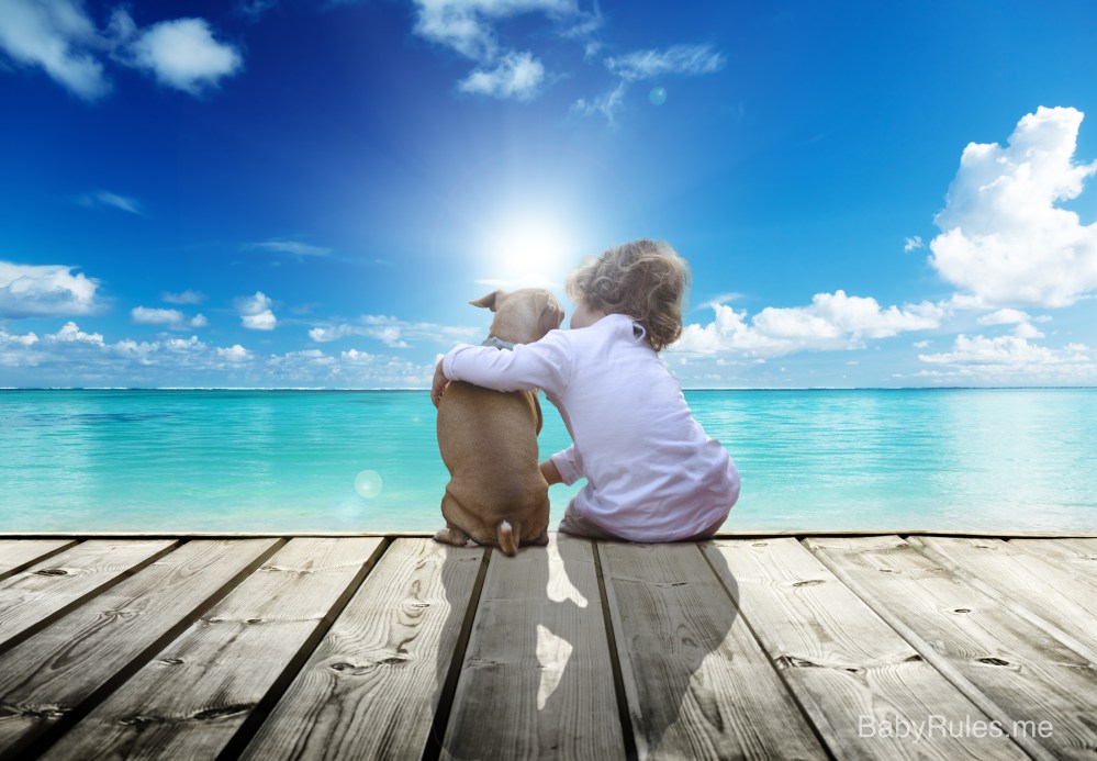Kid with her dog on a pier